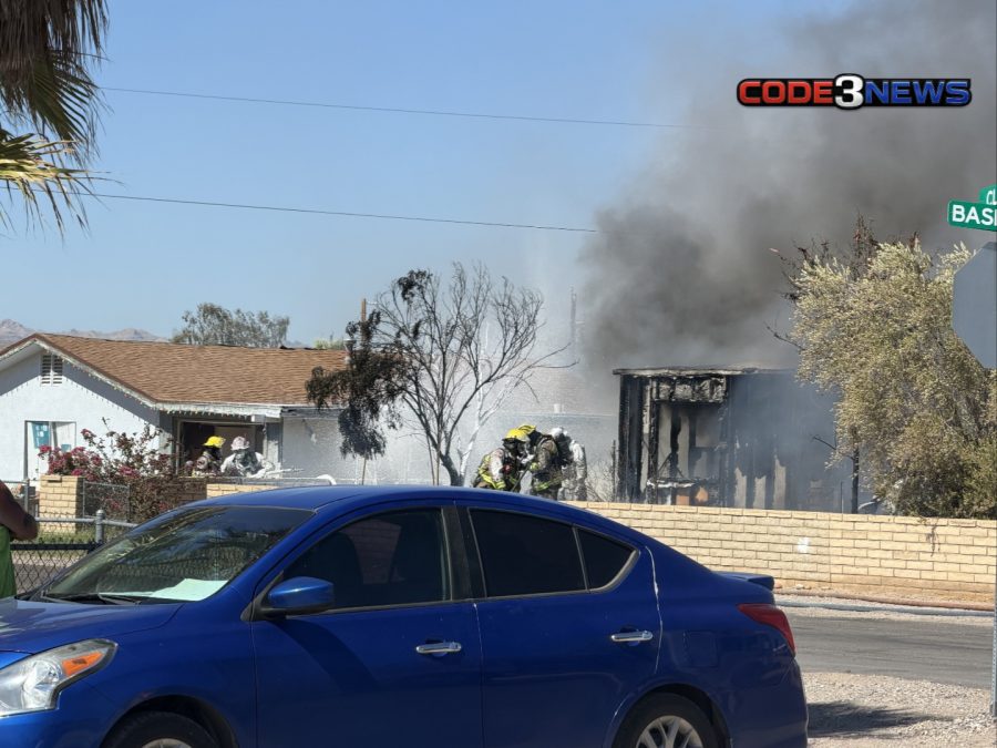 Bullhead City structure fire on Baseline Road with smoke visible from the scene